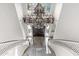 View of the entryway from above, showcasing the staircase and chandelier at 2822 E Clifton Ct, Gilbert, AZ 85295