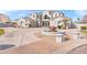 Luxury home with a circular driveway and a water fountain at 2822 E Clifton Ct, Gilbert, AZ 85295