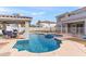 Beautiful pool area with a covered patio and seating for relaxation at 2822 E Clifton Ct, Gilbert, AZ 85295