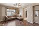 Cozy sitting area with L-shaped sofa and hardwood floors at 2822 E Clifton Ct, Gilbert, AZ 85295