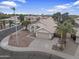 A neighborhood view shows single Gathering homes, palm trees, sidewalks, and well-maintained roads at 2830 S Arroyo Ct, Chandler, AZ 85286