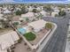 Aerial view of property featuring a large backyard pool, manicured landscaping, and proximity to neighborhood amenities at 2830 S Arroyo Ct, Chandler, AZ 85286