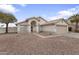 Charming single-Gathering home with an arched entryway, low-maintenance landscaping, and a two-car garage at 2830 S Arroyo Ct, Chandler, AZ 85286