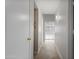 Hallway that provides a grand view of the living room, showcasing the seamless flow of the home's layout at 2830 S Arroyo Ct, Chandler, AZ 85286