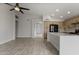 Bright kitchen with stainless appliances and plenty of cabinet space is open to the living area at 2830 S Arroyo Ct, Chandler, AZ 85286