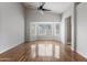 Main bedroom with a bay window, natural light, and wood floors at 2830 S Arroyo Ct, Chandler, AZ 85286