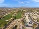 Aerial view of homes and golf course with mountain backdrop at 29840 N 43Rd Way, Cave Creek, AZ 85331