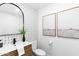 Stylish powder room with patterned tile and a floating vanity at 29840 N 43Rd Way, Cave Creek, AZ 85331