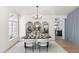 Bright dining room with modern chandelier and stylish furnishings at 29840 N 43Rd Way, Cave Creek, AZ 85331