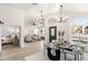 Open concept dining area with adjacent living and bedroom areas at 29840 N 43Rd Way, Cave Creek, AZ 85331