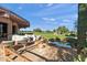 Relaxing patio area with golf course views and pond at 29840 N 43Rd Way, Cave Creek, AZ 85331