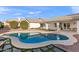 Inviting kidney-shaped pool with flagstone walkways at 29840 N 43Rd Way, Cave Creek, AZ 85331