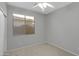 Bright bedroom with neutral walls and carpet flooring at 29874 N Little Leaf Dr, San Tan Valley, AZ 85143