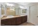 Bathroom boasts double sinks and a large mirror at 3501 E Apricot Ln, Gilbert, AZ 85298