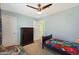 Bedroom with dresser and twin-size bed at 3501 E Apricot Ln, Gilbert, AZ 85298