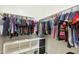 Well-organized closet with ample hanging space and shelves at 3501 E Apricot Ln, Gilbert, AZ 85298