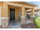 Charming covered front porch with stylish pillars and welcoming entrance at 3501 E Apricot Ln, Gilbert, AZ 85298
