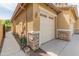 Attached garage with stone accents and a well-maintained exterior at 3501 E Apricot Ln, Gilbert, AZ 85298