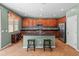 Elegant kitchen with granite counters, stainless steel appliances, an island with bar seating and plenty of cabinets at 3501 E Apricot Ln, Gilbert, AZ 85298