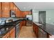 Well-appointed kitchen with granite countertops, stainless steel appliances, and ample cabinet space at 3501 E Apricot Ln, Gilbert, AZ 85298