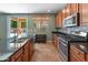 Well-equipped kitchen showcasing granite countertops, stainless steel appliances, and ample cabinet space at 3501 E Apricot Ln, Gilbert, AZ 85298