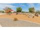 Bright and fun playground area with shade in The Bridges at Gilbert neighborhood with colorful structures at 3501 E Apricot Ln, Gilbert, AZ 85298