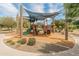 Community playground with shade and modern play equipment at 3501 E Apricot Ln, Gilbert, AZ 85298