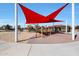 Community playground with shade structure and play equipment at 3501 E Apricot Ln, Gilbert, AZ 85298