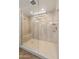 Modern shower with dual shower heads, a built-in bench, and stylish tile work at 3501 E Apricot Ln, Gilbert, AZ 85298