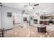 Open concept living room with kitchen and tile floors at 3621 W Glass Ln, Phoenix, AZ 85041