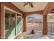 Covered patio with access to backyard and ceiling fan at 3621 W Glass Ln, Phoenix, AZ 85041