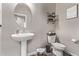 Clean bathroom with pedestal sink and toilet at 36582 N Lincoln Red Rd, San Tan Valley, AZ 85143