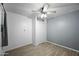 Bedroom with ceiling fan and double door closet at 3707 W Encanto Blvd, Phoenix, AZ 85009