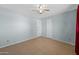 Bright bedroom with ceiling fan and tile floors at 3707 W Encanto Blvd, Phoenix, AZ 85009