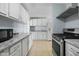 Updated kitchen featuring granite countertops and modern appliances at 3707 W Encanto Blvd, Phoenix, AZ 85009