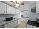 Bright kitchen with granite countertops and stainless steel appliances at 3707 W Encanto Blvd, Phoenix, AZ 85009