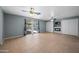 Living room with tile floors, fireplace, and sliding doors to patio at 3707 W Encanto Blvd, Phoenix, AZ 85009