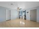 Bright and airy living room with tile floors and ceiling fan at 3707 W Encanto Blvd, Phoenix, AZ 85009