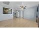 Open concept living room with view of kitchen and tile floors at 3707 W Encanto Blvd, Phoenix, AZ 85009