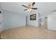 Spacious living area with tile floors and kitchen access at 3707 W Encanto Blvd, Phoenix, AZ 85009