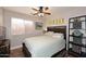 Bedroom with wood flooring and a ceiling fan at 4741 S Desert Dawn Dr, Gold Canyon, AZ 85118