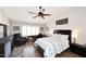 Main bedroom with hardwood floors, ceiling fan and lots of natural light at 4741 S Desert Dawn Dr, Gold Canyon, AZ 85118