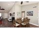 Dining area with a rustic wood table and chairs at 4741 S Desert Dawn Dr, Gold Canyon, AZ 85118