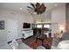 Open living space with a view of the dining room and kitchen at 4741 S Desert Dawn Dr, Gold Canyon, AZ 85118