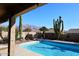 Sparkling pool, desert landscape and mountains at 4741 S Desert Dawn Dr, Gold Canyon, AZ 85118