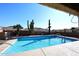 Relaxing pool area with desert landscaping at 4741 S Desert Dawn Dr, Gold Canyon, AZ 85118