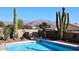 Inviting pool with mountain views and desert landscaping at 4741 S Desert Dawn Dr, Gold Canyon, AZ 85118