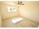 Light and airy bedroom, featuring wood-look floors and ceiling fan at 4901 W Cheery Lynn Rd, Phoenix, AZ 85031