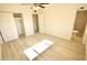 Spacious bedroom with wood-look floors and en-suite bathroom at 4901 W Cheery Lynn Rd, Phoenix, AZ 85031