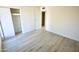 Bedroom with wood-look floors and spacious closet at 4901 W Cheery Lynn Rd, Phoenix, AZ 85031